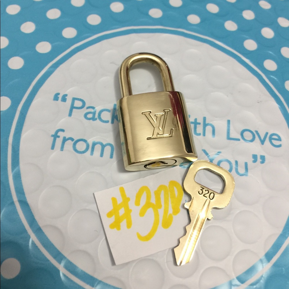 Authentic Louis Vuitton Lock and key 320 - Picture 2 of 5